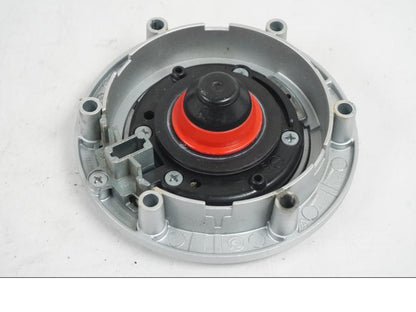 Snett uppifrån på <p>Låssats från BMW R 1200 RT 2013.</p>

<p>Tändningslås (endast mekanismen), tanklock, sadellås, larmdosa, 1st nyckel och 1st dosa.</p> motorcykel.