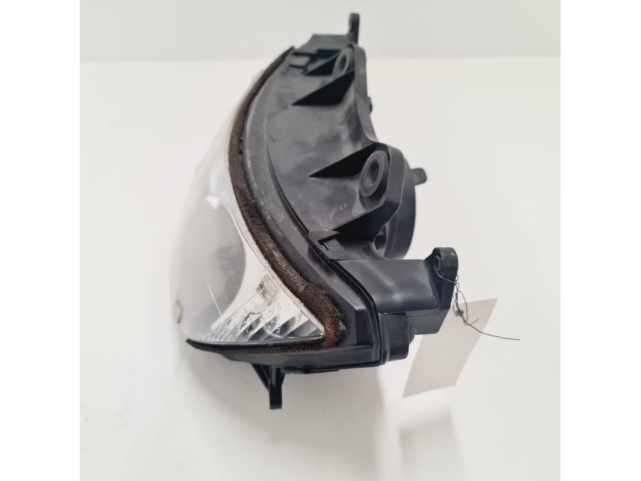 Vänster sida på Strålkastare från en Kawasaki ZX-6R -1998 motorcykel.