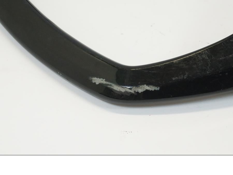 Vänster sida på Passagerarhandtag från en Yamaha FZ-S 600 -2001 motorcykel.