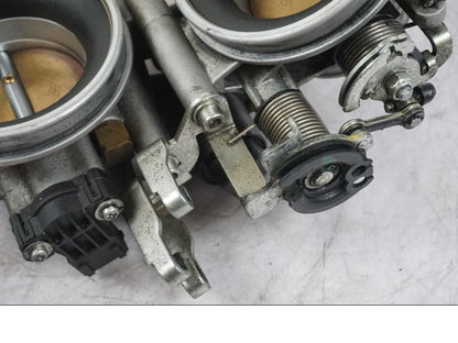 Höger sida på Spjällhus från en Buell 1125 R -2008 motorcykel.