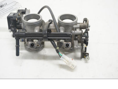 Baksidan på Spjällhus från en Kawasaki Versys 650 -2008 motorcykel.