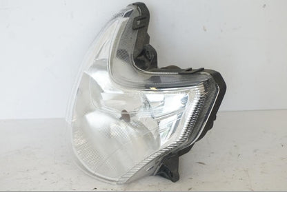 Baksidan på Strålkastare från en Honda SH 300 A -2011 scooter.