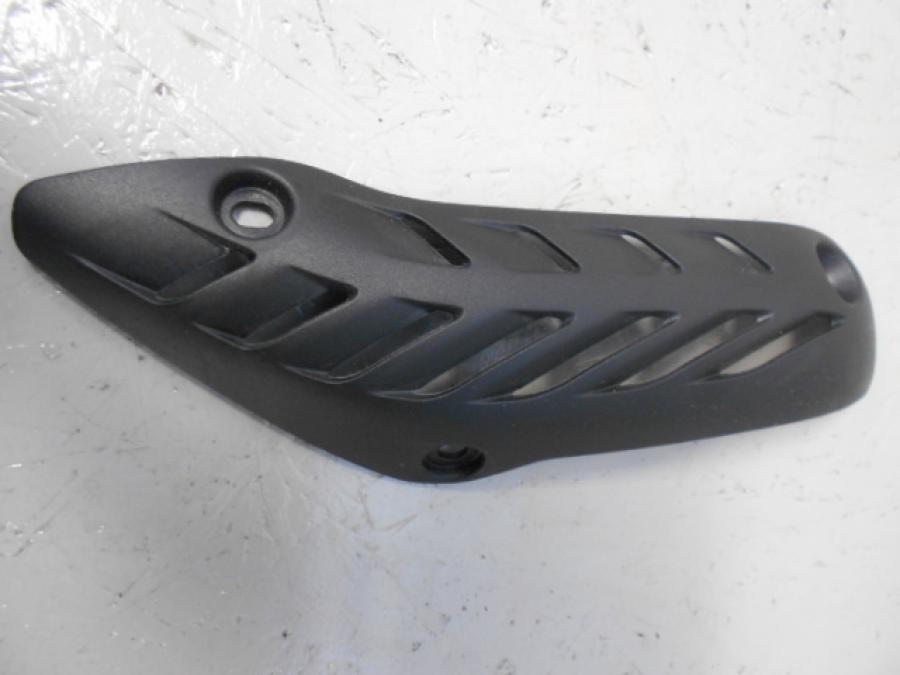 Framsidan på Värmeskydd från en Ducati Monster 1200 -2014 motorcykel.