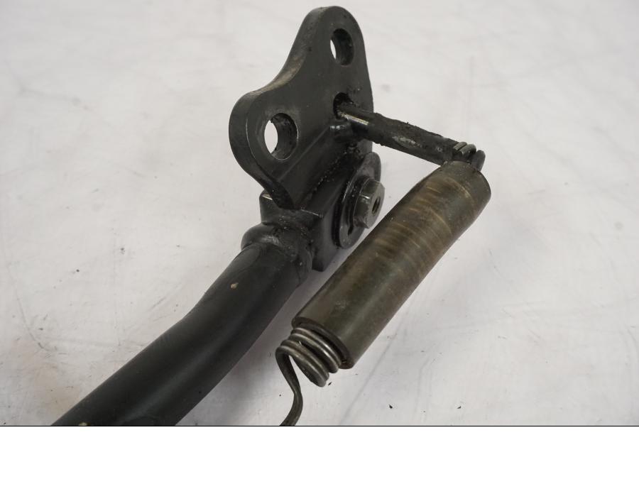 Vänster sida på Sidostöd från en Honda CBR 900 RR -2003 motorcykel.