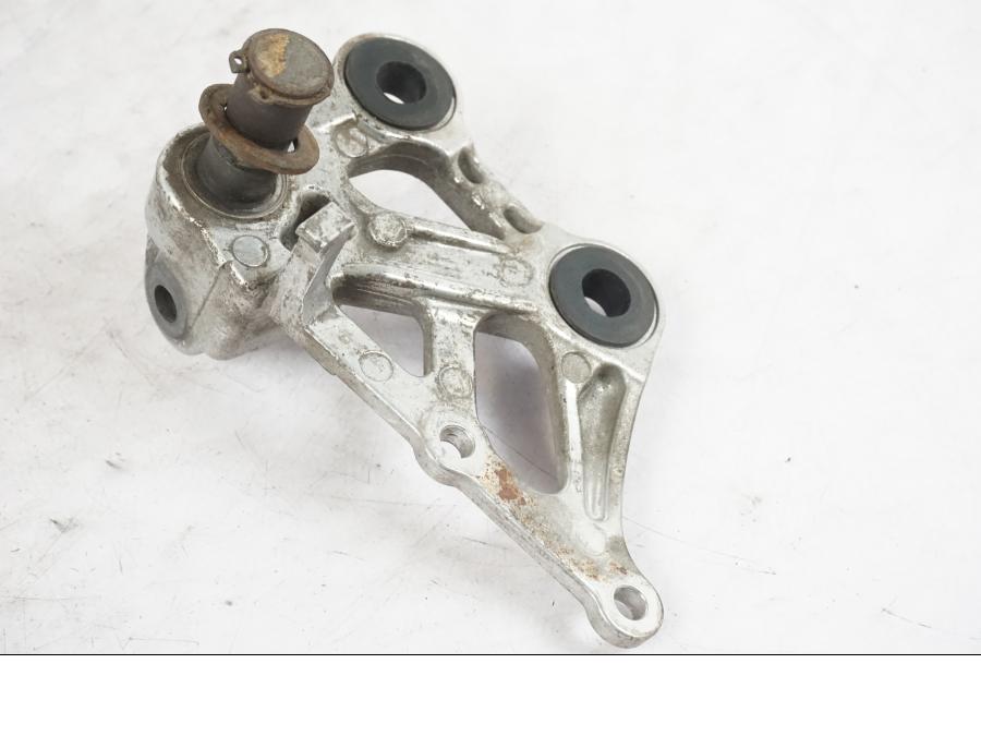 Vänster sida på Fotpinnefäste från en Honda CBR 1000 F -1989 motorcykel.