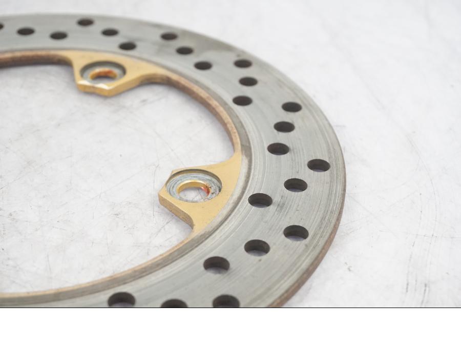 Vänster sida på Bromsskiva från en Kawasaki Z 1000 -2003 motorcykel.